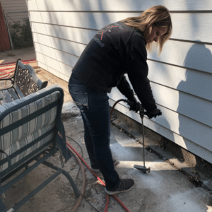 Licensed Legacy Pest Control technician inspecting home